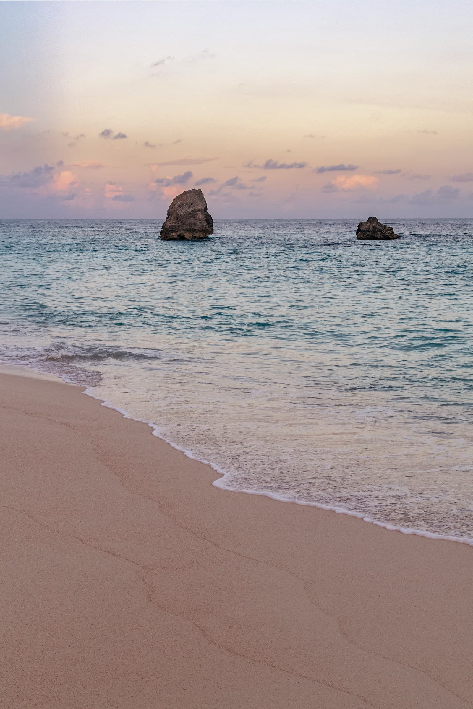 Pink sand and sea stacks at sunset in Bermuda