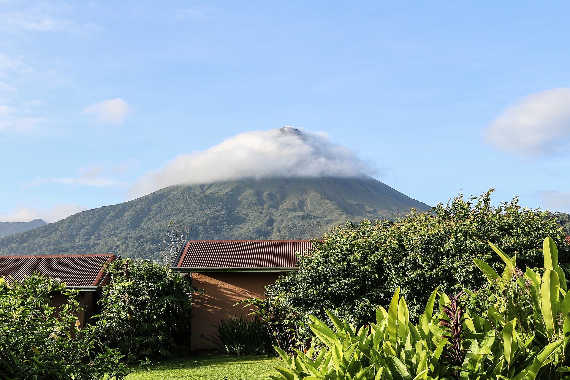 Arenal Volcano rising above tropical forest in Costa Rica
